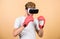 Cyber sportsman boxing gloves. Man play game in VR glasses. Cyber sport concept. Man boxer virtual reality headset