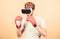 Cyber sportsman boxing gloves. Man play game in VR glasses. Cyber sport concept. Man boxer virtual reality headset