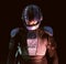 Cyberpunk future concept. Portrait of bionic cyborg police officer in dark. Halfman robot looks at camera. Futuristic science