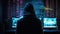 Cybersecurity Vigilance: Hacker Silhouette Reflects Digital Threats