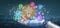 Cyborg hand holding a Cloud of colorfull start up icon bubble wi