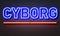 Cyborg neon sign on brick wall background.