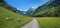 Cycle and hiking route through idyllic trettach valley, near health resort oberstdorf. allgau landscape at springtime