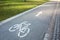 Cycle path with bicycle symbol and arrow as guidance system