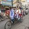Cycle rickshaws with passengers in the streets of Delhi