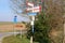 Cycle route signs rural landscape, Netherlands