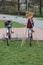 Cycles with broomsticks parked in garden