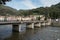 Cycling across the Umberto bridge over the Brembo river in San Pellegrino Lombardy