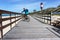 Cycling along the embankment, a young man on the boardwalk