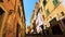 Cycling on a bike in Rome through an ancient alley in rome FDV slow motion, pov