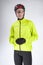 Cycling concepts. Portrait of Young Caucasian Man in Cycling Outfit. Putting on Protective Helmet