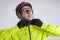 Cycling concepts. Portrait of Young Caucasian Man in Cycling Outfit. Putting on Protective Helmet