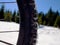 Cycling on large tyres in fresh snow. Biker goes by bike on the snowy road