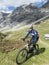 Cycling on mountainbike in the high mountains