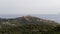 Cycling in the National Park Sounio with the view of ancient temple of Poseidon, south of Athens, Greece