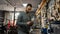 Cycling service man writing notes in workshop