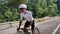 Cycling sport concept. Triathlete cyclist training on race bicycle. Sport recreation fitness activity. Man riding triathlon road b