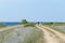 Cycling tourists at a beautiful coastal road