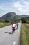 Cycling tourists going a scenic road in Norway in summer