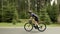 Cycling. Triathlon. Cyclist training on bicycle. Sport fitness woman riding road bike, ready for triathlon. Athlete workout traini