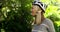 Cycling woman, nature adventure and smile outdoor, forest and happy in summer, sunshine and trees. Mountain bike rider