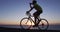 Cyclist athlete man cycling biking training exercise and drinking water