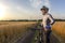 Cyclist on Bicycle looks at sunset. sports and hobbies. outdoor activities