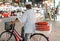 Cyclist on a city street at night, Kyoto in Japan. Close-up. Back view.