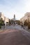 A cyclist crossing the road and a church in central London  Uk