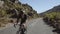 Cyclist doing uphill ride on mountain roads