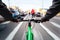 Cyclist drives on the bike path past the traffic jam