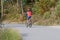 Cyclist on forest path