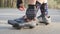 Cyclist girl tightens road shoes before the bicycle ride. Close up