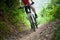 Cyclist legs riding Mountain Bike