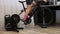 Cyclist legs are training on cycling stationary trainer. Fitness cardio workout