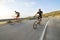 Cyclist man riding mountain bike in sunny day