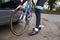 Cyclist preparing his bike for a ride, low section crop