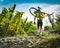 Cyclist raises the mountain bikes on their shoulders.