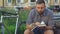 Cyclist reads book on the bench