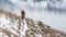 Cyclist in Red Riding Mountain Bike on the Snowy Trail. Extreme Winter Sport and Enduro Biking Concept.