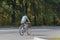 Cyclist rides on the highway on a bicycle