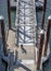 Cyclist rides on the transition between floating docks on the river