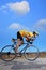 Cyclist riding a bike on an open road