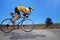 Cyclist riding a bike on an open road