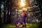 Cyclist Riding the Bike on the Trail in Beautiful Fairy Pine Forest. Adventure and Travel Concept.