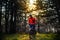 Cyclist Riding the Bike on the Trail in Beautiful Fairy Pine Forest. Adventure and Travel Concept.