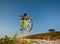 Cyclist riding downhill on mountain bike on the hill