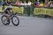 Cyclist Rounds Tight Turn at Uptown Criterium