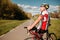 Cyclist in sportswear, cycling on asphalt road