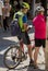 Cyclist takes a break in medieval village of Beynac et Cazenac, Dordogne department, France